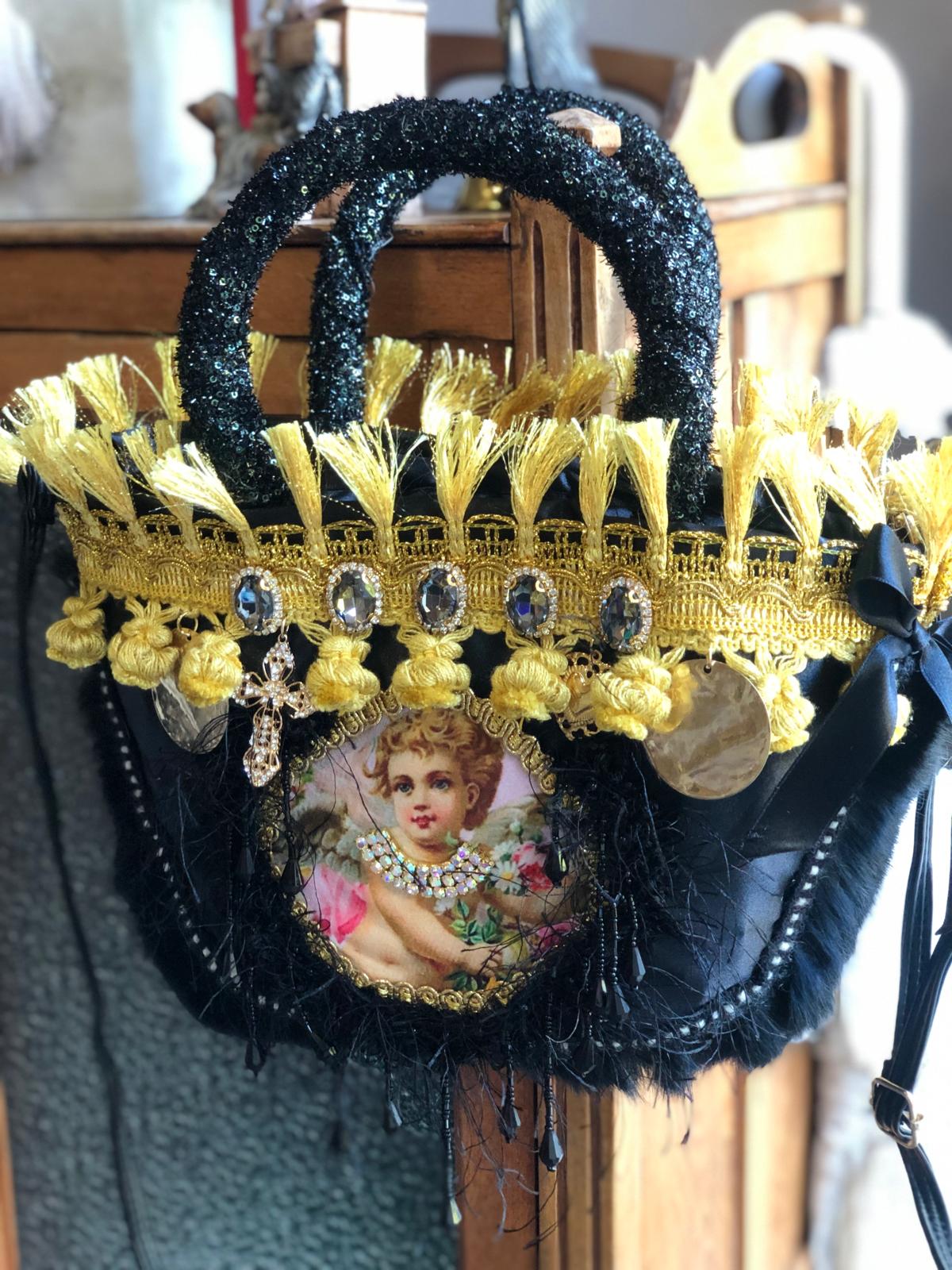Basket with angel among the roses